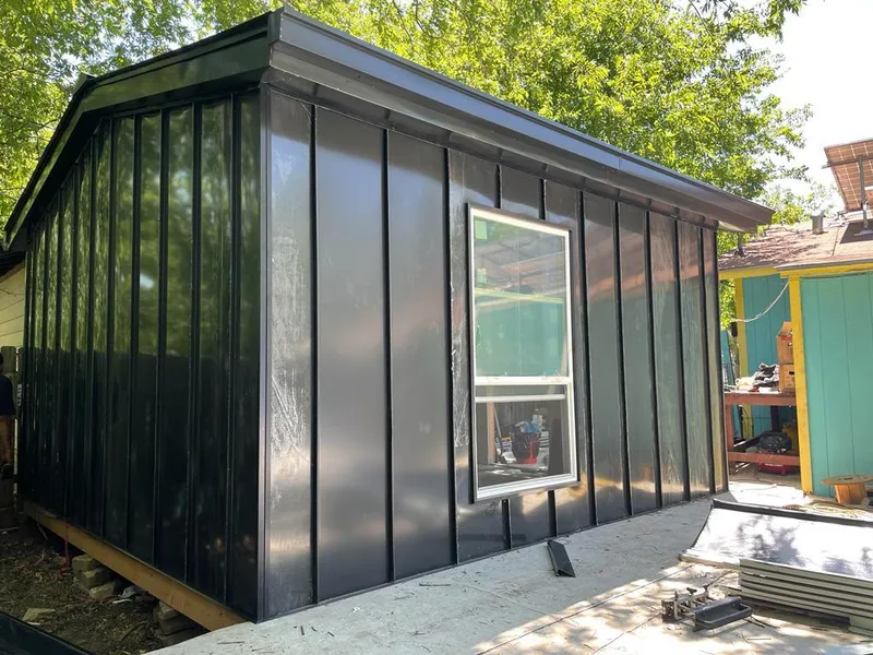 Black standing seam metal wall panels for Metal Roof Installation in O'Fallon